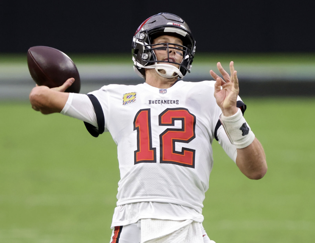 Quarterback drop under stadium lights